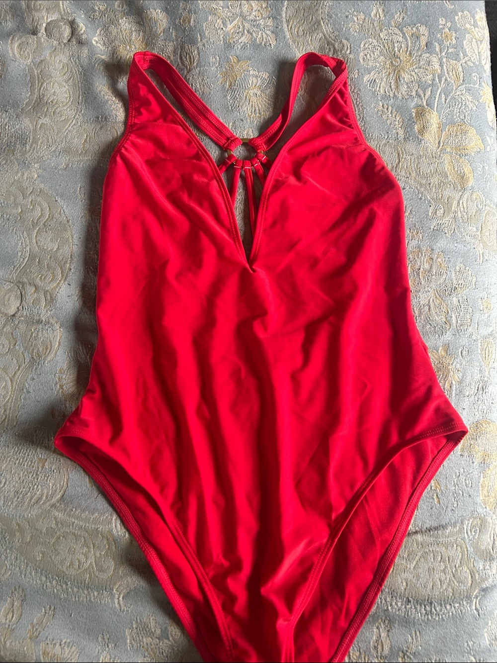 Woman’s Red One-Piece Swimsuit with Ring Detail